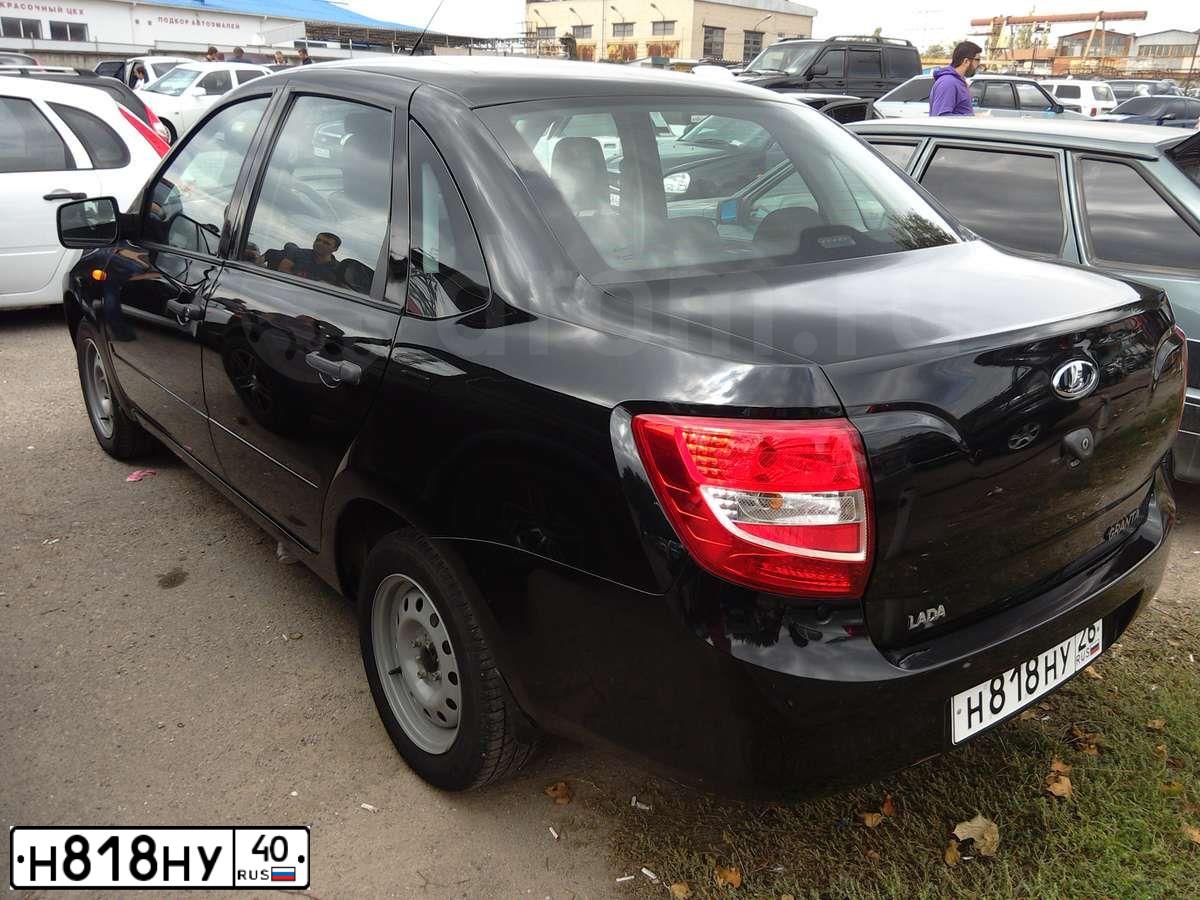 Фото автомобиля SKODA OCTAVIA, 2009 — госномер Е530СВ199. Цвет: ТЕМНО-СЕРЫЙ