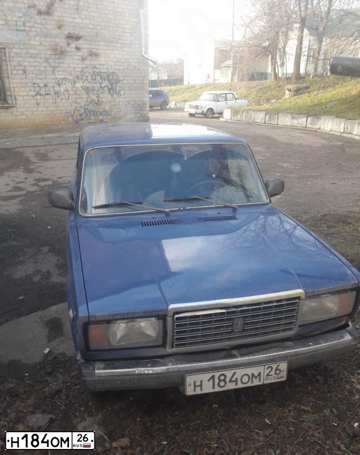 Фото автомобиля LADA 2107, 2002 — госномер Н184ОМ26. Цвет: СИНИЙ