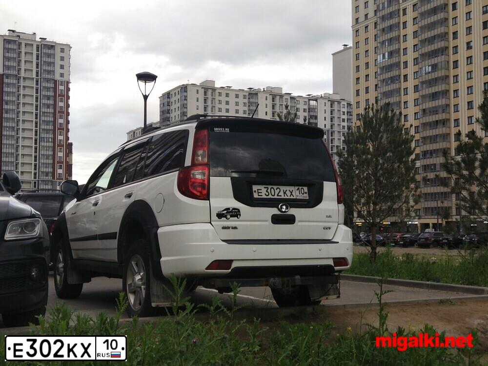 Фото автомобиля CHEVROLET NIVA, 2004 — госномер Е302КХ10. Цвет: ТЕМНО-СИНИЙ МЕТАЛЛИК