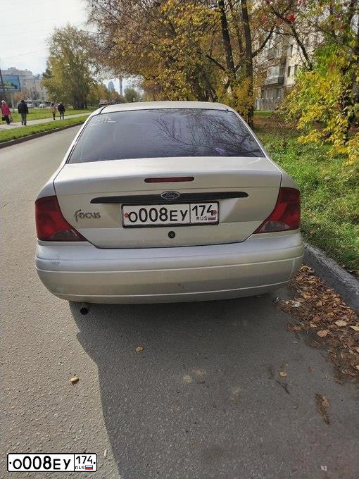 Фото автомобиля FORD D FOCUS, 2002 — госномер О008ЕУ174. Цвет: Серебристый