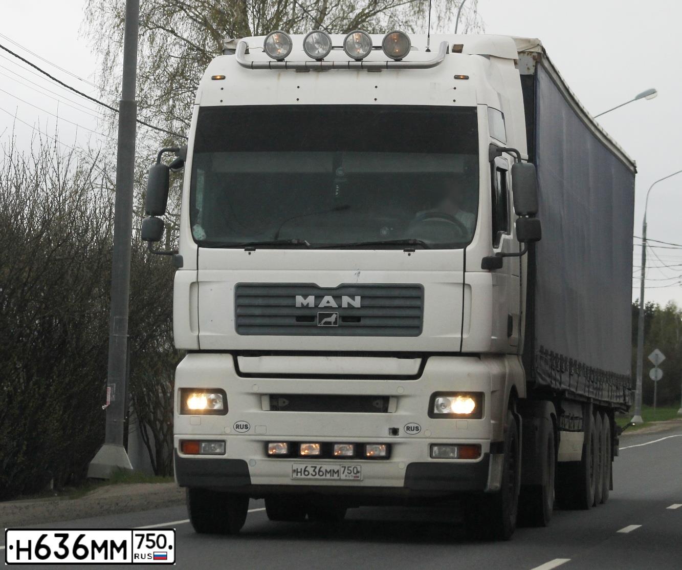 Фото автомобиля MAN TGS 18.XXX /4X2/, 2010 — госномер М167АУ790. Цвет: Красный