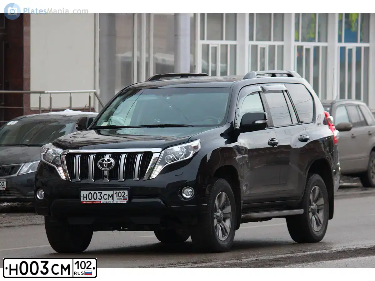 Фото автомобиля TOYOTA LANDCRUISER, 2012 — госномер Н003СМ102. Цвет: ЧЕРНЫЙ