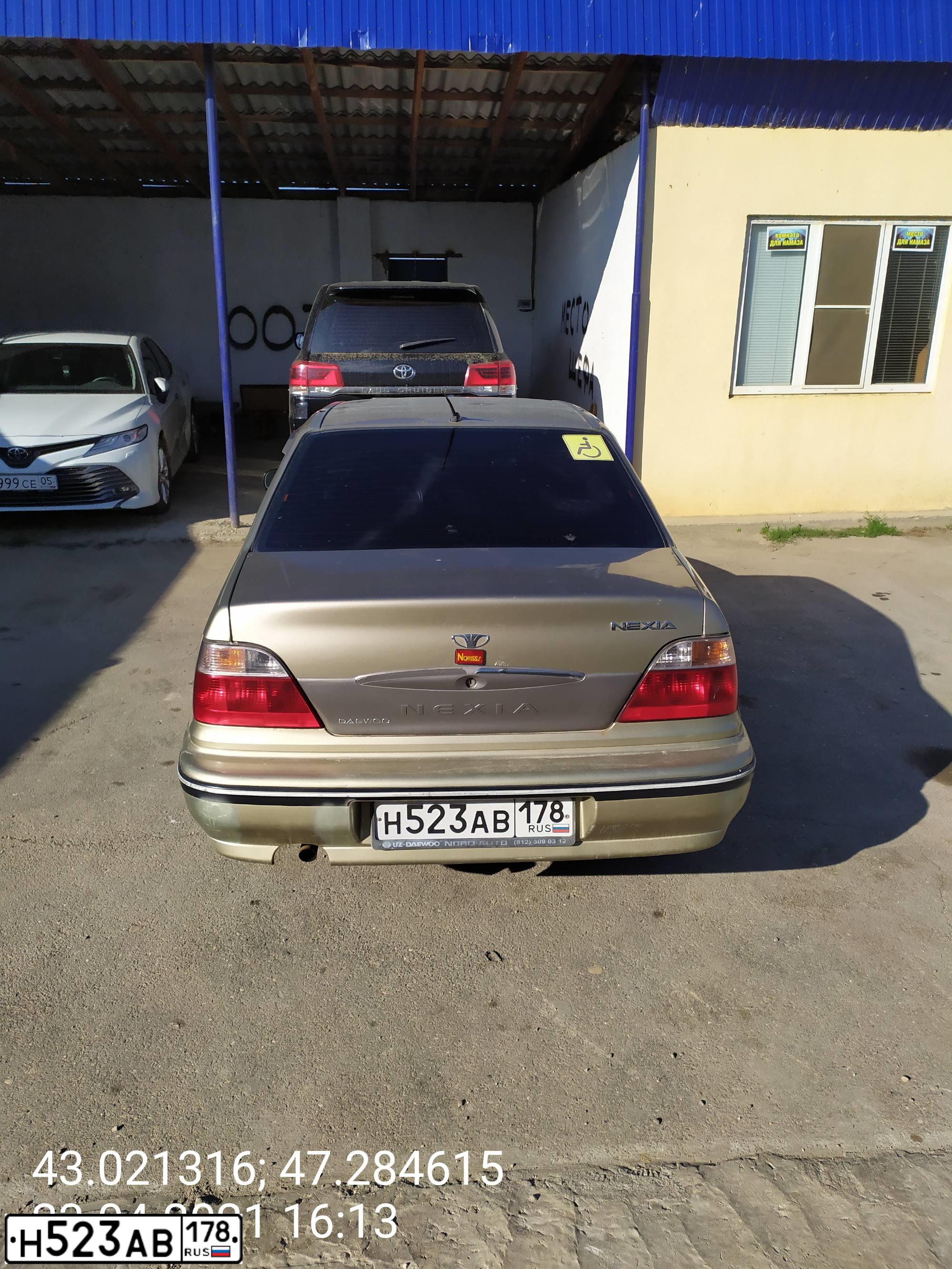 Фото автомобиля DAEWOO NEXIA, 2006 — госномер Н523АВ178. Цвет: БЕЖЕВО-СЕРЫЙ
