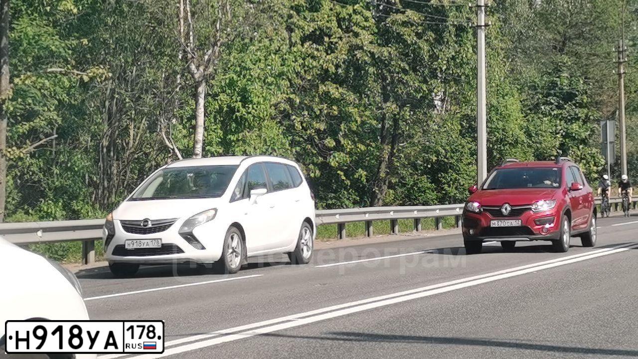 Фото автомобиля OPEL ZAFIRA, 2013 — госномер Н918УА178. Цвет: Белый