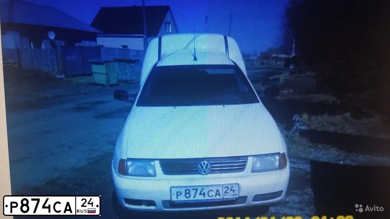 Фото автомобиля VOLKSWAGEN CADDY, 2001 — госномер Р874СА24. Цвет: Белый