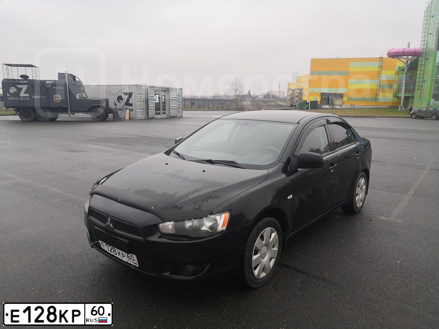 Фото автомобиля MITSUBISHI LANCER, 2007 — госномер Н275РН159. Цвет: ЧЕРНЫЙ