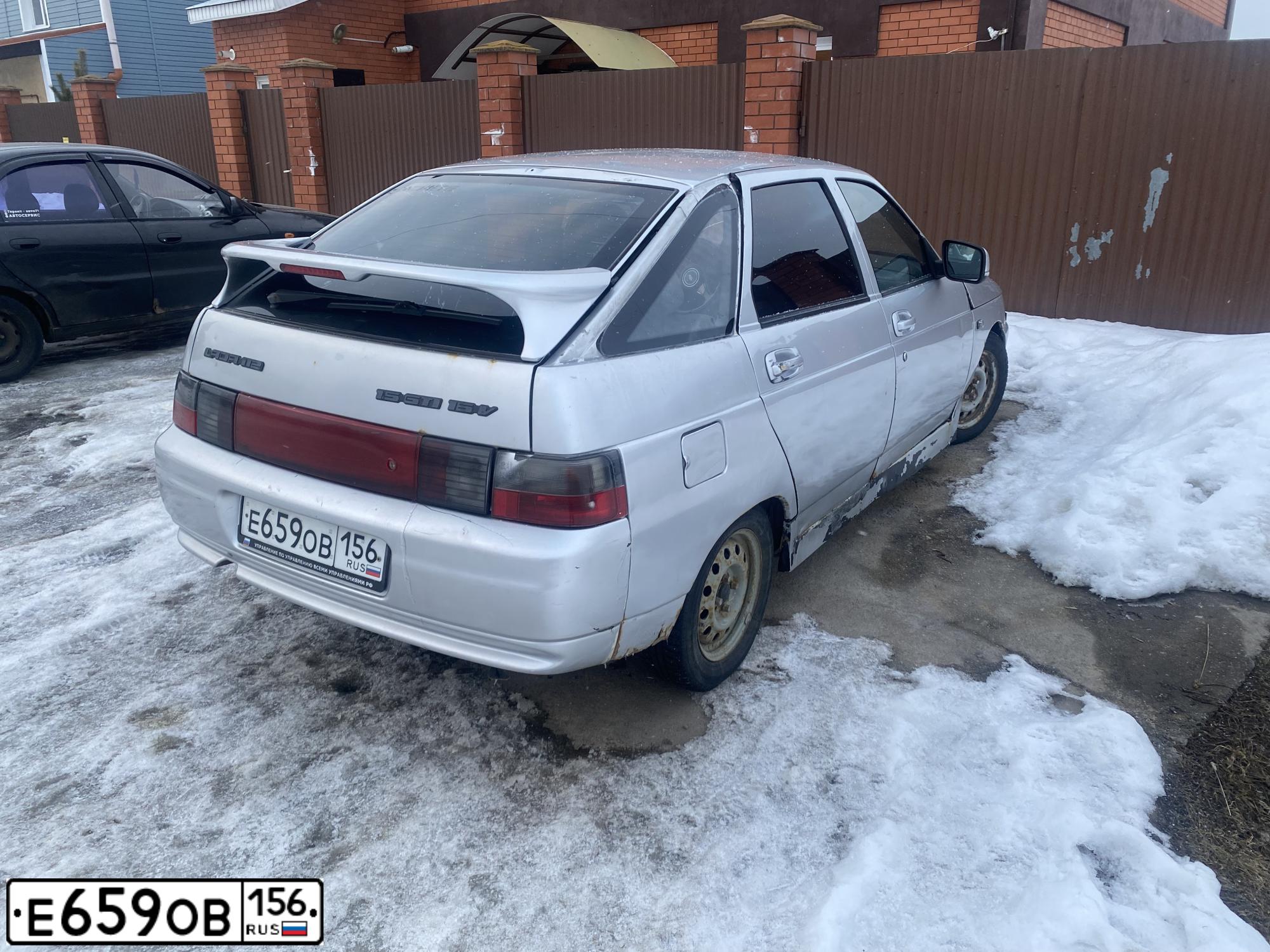 Фото автомобиля LADA 2112, 2003 — госномер Е659ОВ156. Цвет: СЕРЕБРИСТЫЙ