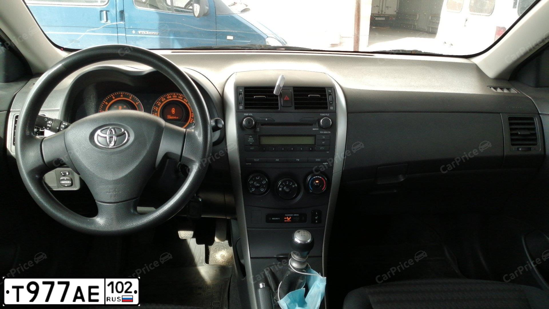 Фото автомобиля TOYOTA COROLLA, 2009 — госномер К709ТА702. Цвет: ЧЕРНЫЙ