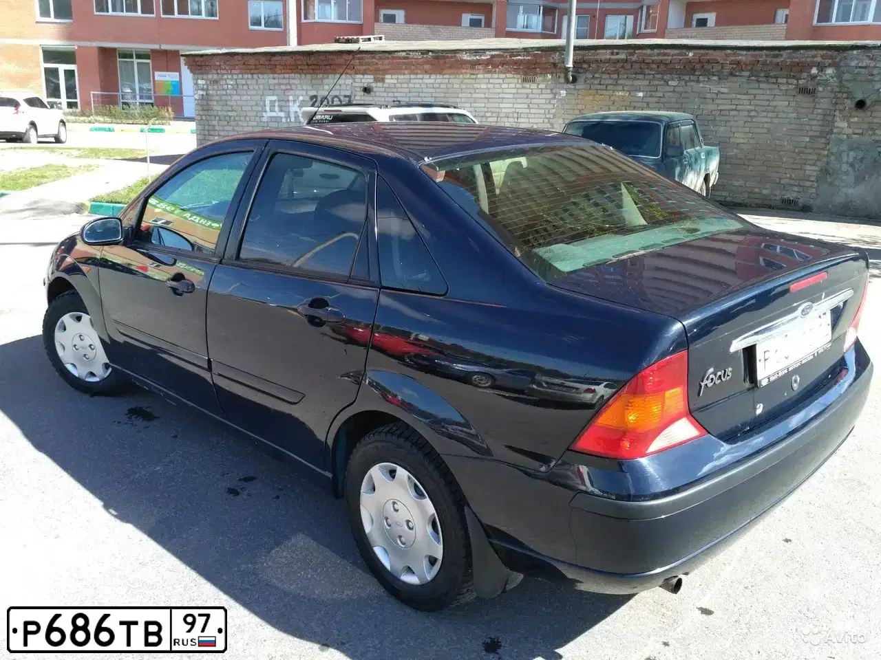 Фото автомобиля FORD FOCUS, 2004 — госномер Е364ЕР76. Цвет: Темно-синий