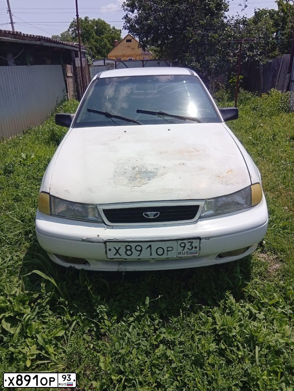 Фото автомобиля DAEWOO NEXIA, 1997 — госномер Х891ОР93. Цвет: Белый