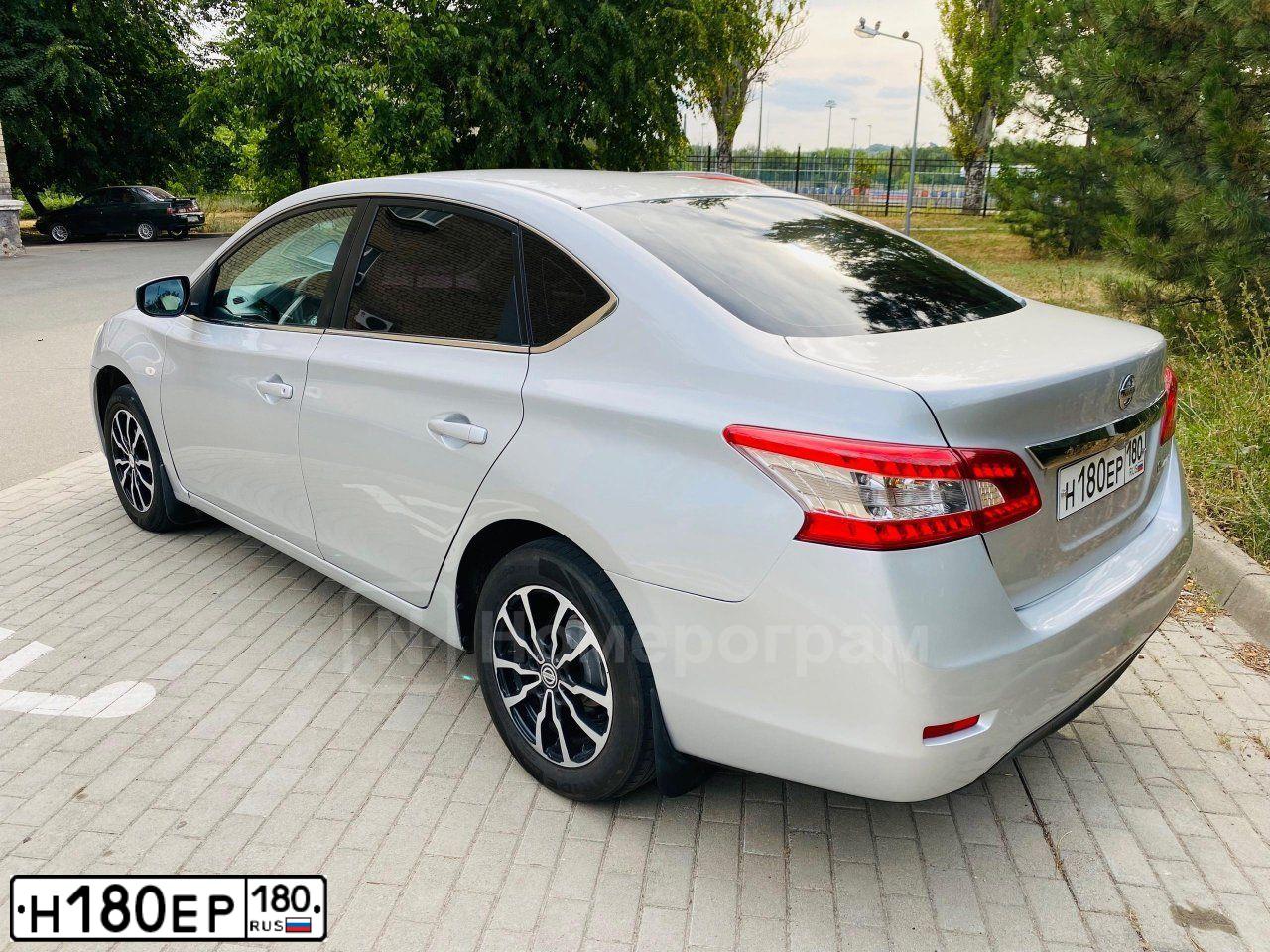Фото автомобиля NISSAN SENTRALUCINO, 2015 — госномер Н180ЕР180. Цвет: Серебристый