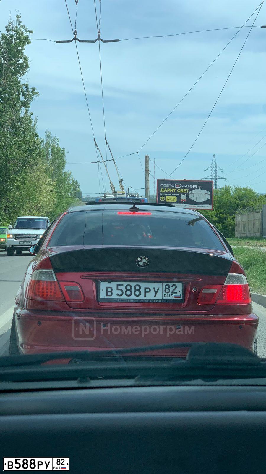 Фото автомобиля BMW БМВ 330СI, 2004 — госномер В588РУ82. Цвет: Красный