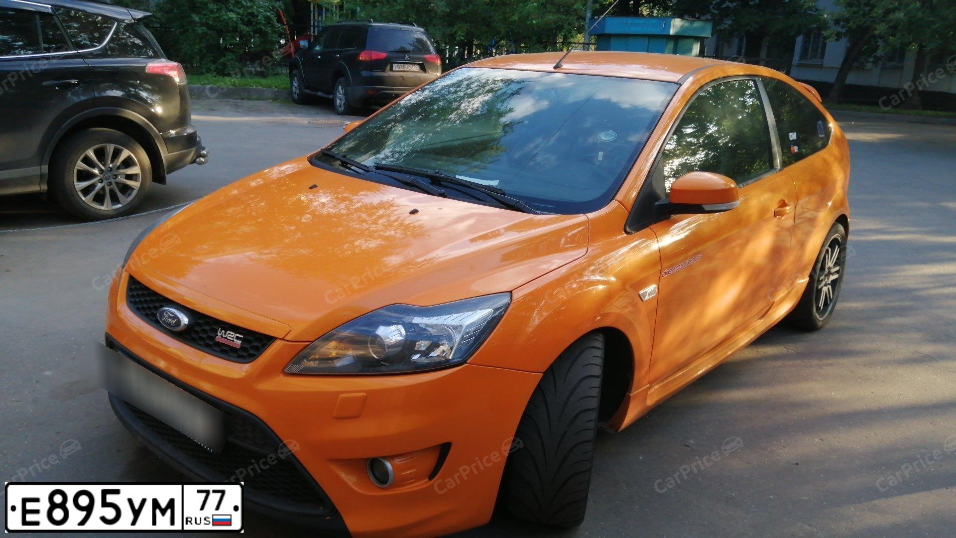 Фото автомобиля FORD D FOCUS, 2008 — госномер М767НА197. Цвет: Оранжевый