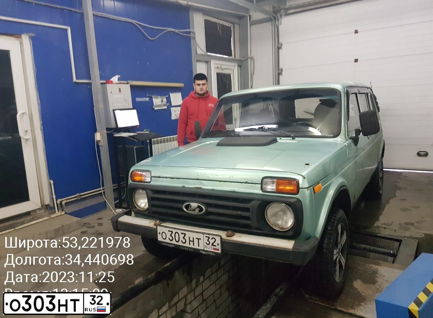 Фото автомобиля LADA 2131 NIVA, 2002 — госномер О303НТ32. Цвет: СЕРЕБРИСТО-СЕРО-ЗЕЛЕНЫЙ