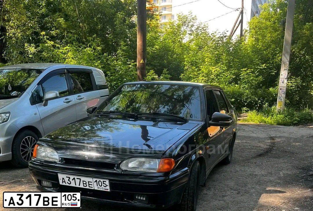 Фото автомобиля LADA 2115 SAMARA, 2011 — госномер Р392ТК70. Цвет: ЧЕРНЫЙ