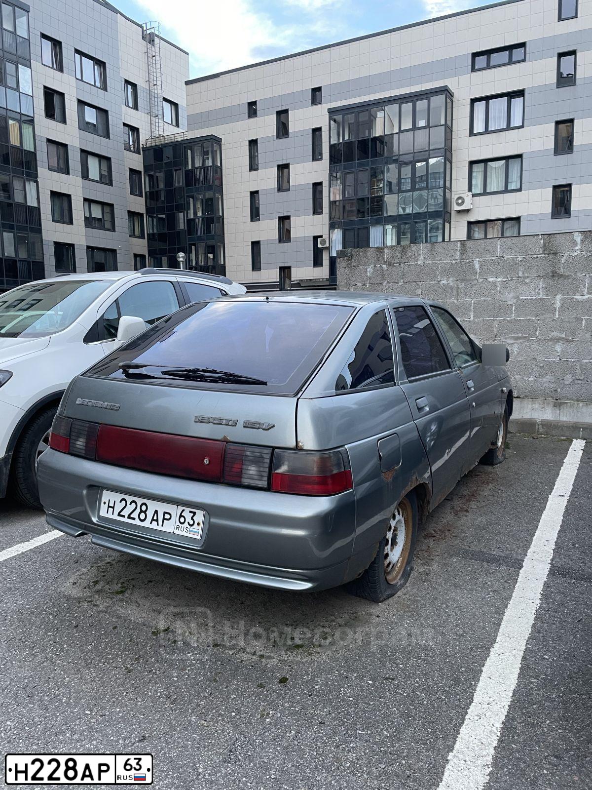 Фото автомобиля LADA 2112, 2004 — госномер Н228АР63. Цвет: СЕРЕБРИСТО-СЕРО-ЗЕЛЕНЫЙ