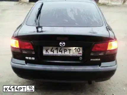 Фото автомобиля MAZDA 626, 1998 — госномер К414РТ10. Цвет: ЗЕЛЕНЫЙ