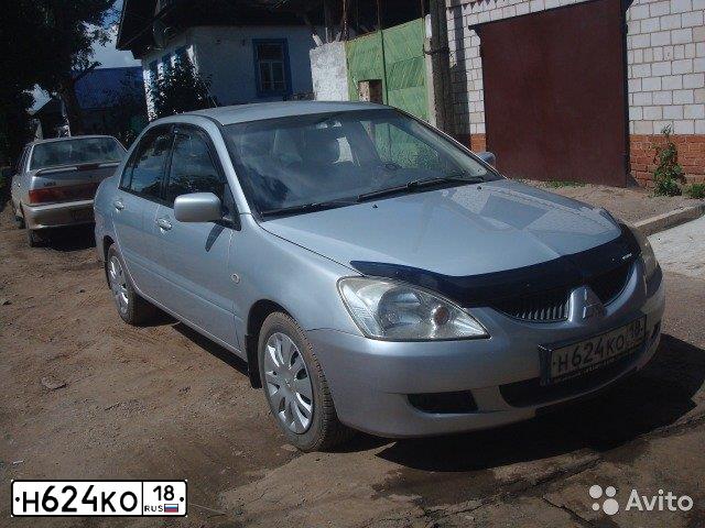 Фото автомобиля MITSUBISHI LANCER, 2004 — госномер О228РР159. Цвет: СЕРЕБРИСТЫЙ