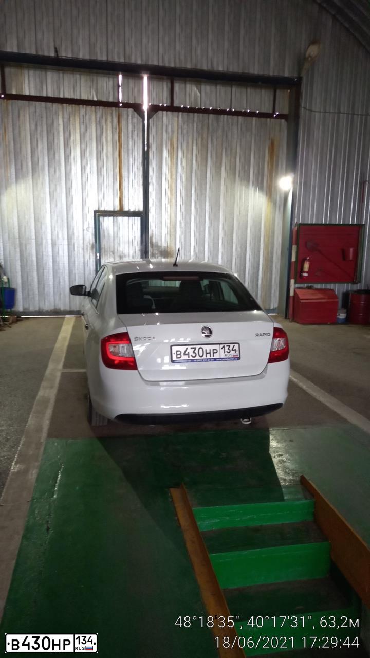 Фото автомобиля SKODA RAPID, 2015 — госномер У231ВМ761. Цвет: Белый