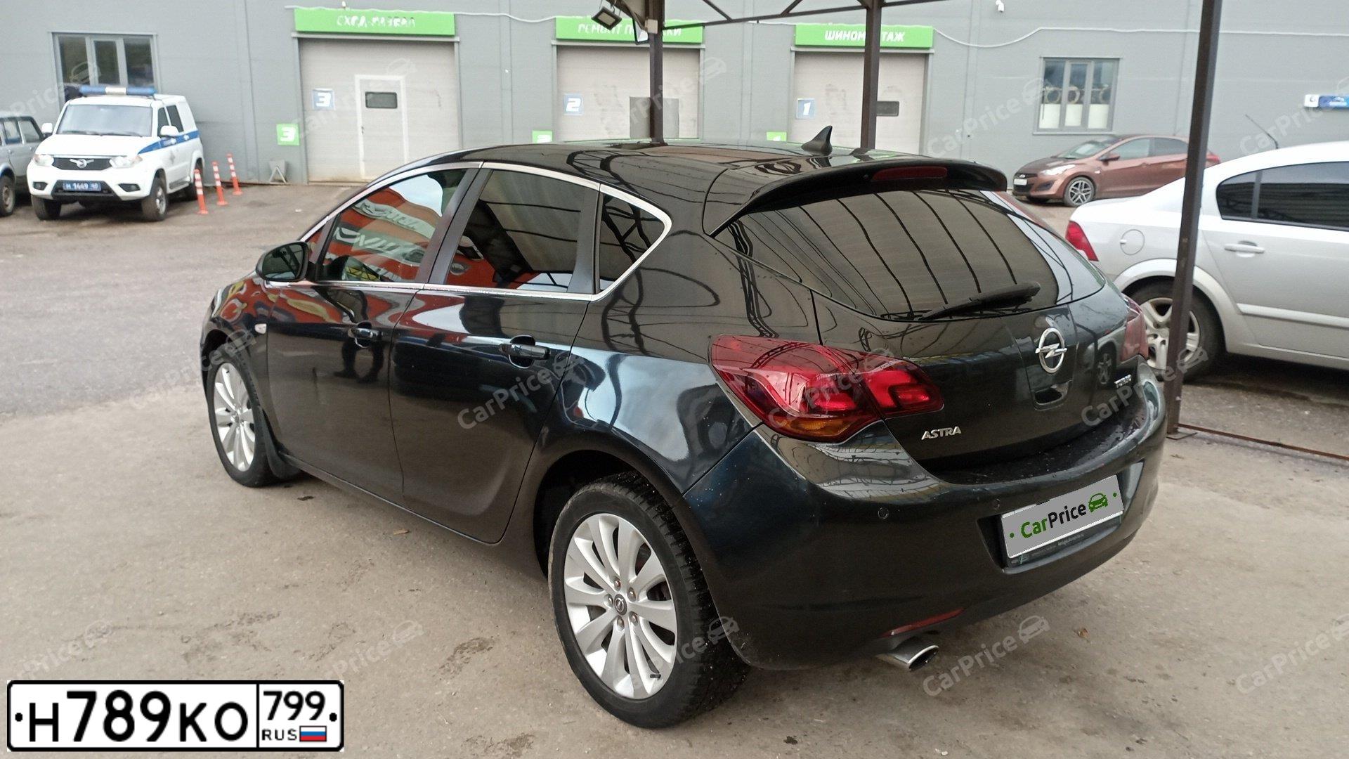 Фото автомобиля OPEL ASTRA, 2011 — госномер С017ОН40. Цвет: ЧЕРНЫЙ МЕТАЛЛИК