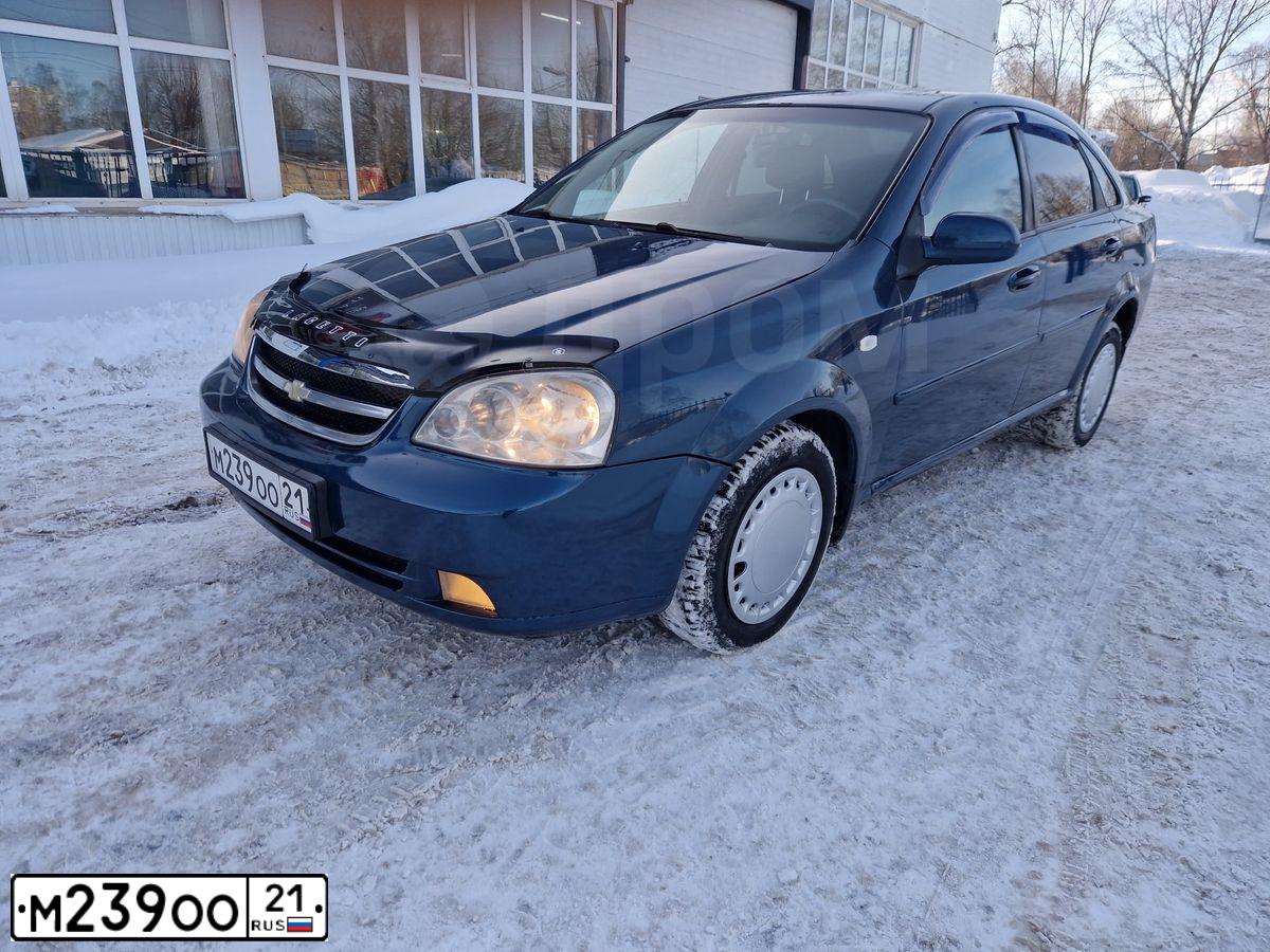 Фото автомобиля CHEVROLET LACETTI, 2008 — госномер В529НС77. Цвет: синий