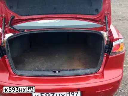 Фото автомобиля MITSUBISHI LANCER, 2011 — госномер А475ЕЕ67. Цвет: Красный