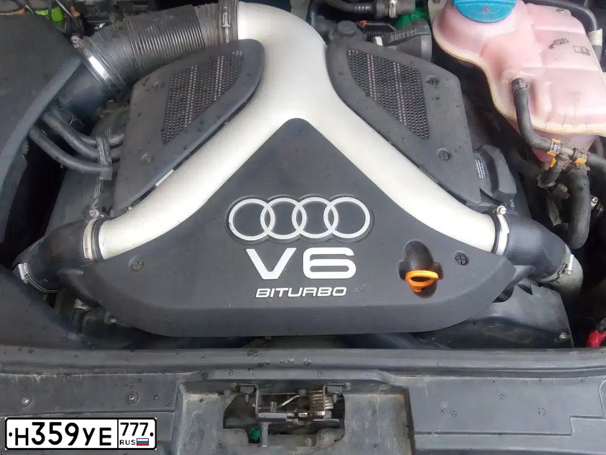 Фото автомобиля AUDI A6, 2001 — госномер Р168МС198. Цвет: ЧЕРНЫЙ