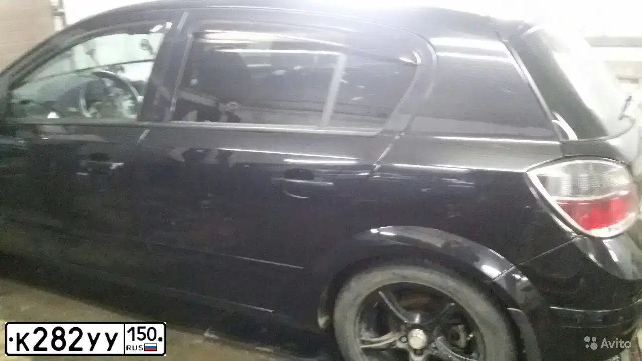 Фото автомобиля OPEL ASTRA, 2008 — госномер К282УУ150. Цвет: ЧЕРНЫЙ