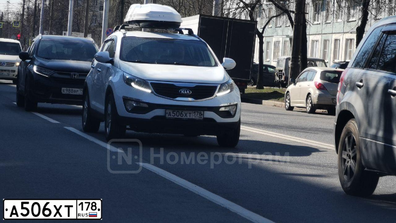 Фото автомобиля KIA SPORTAGE, 2012 — госномер А506ХТ178. Цвет: Белый