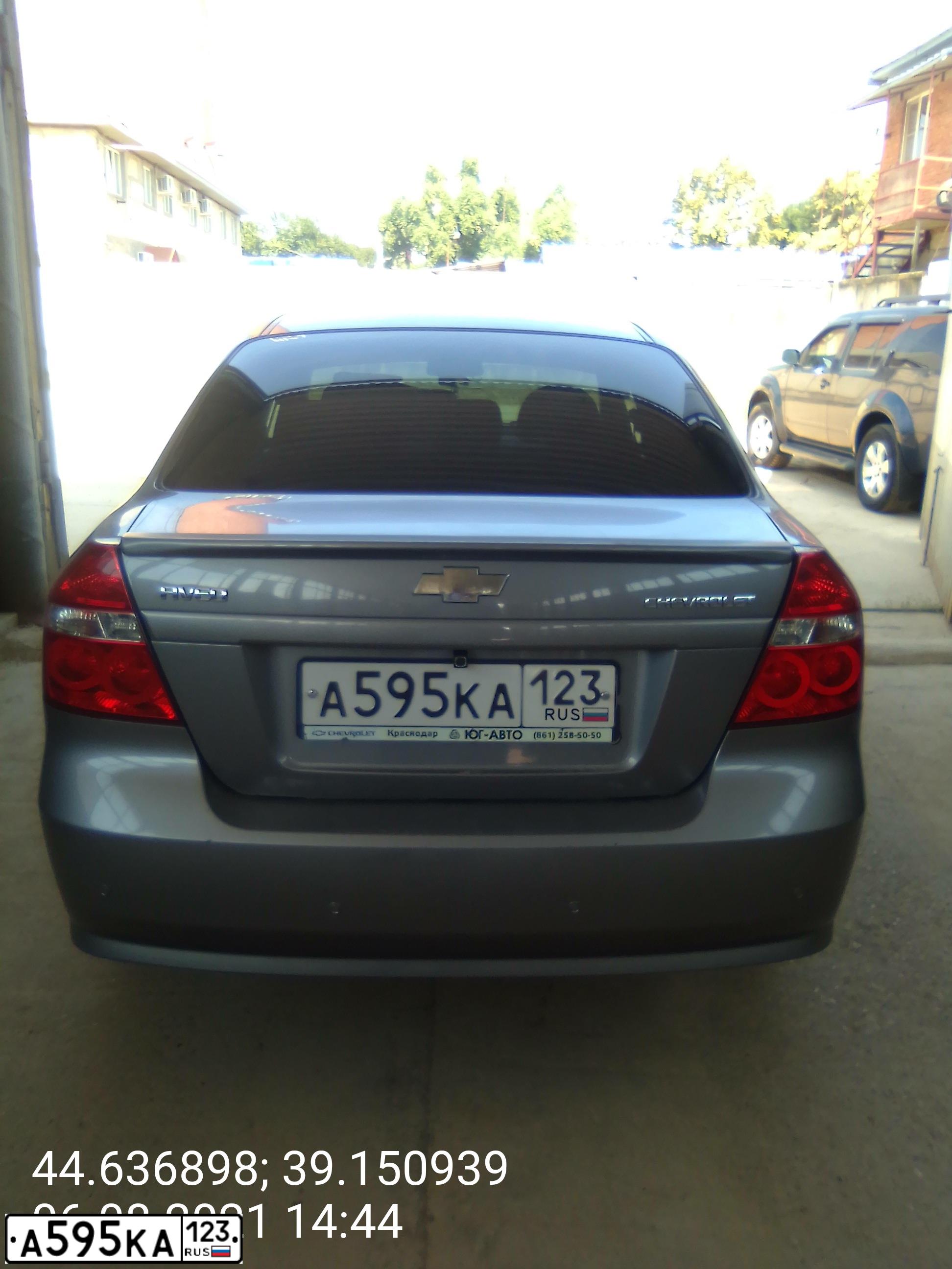 Фото автомобиля CHEVROLET AVEO, 2011 — госномер А595КА123. Цвет: СЕРЫЙ