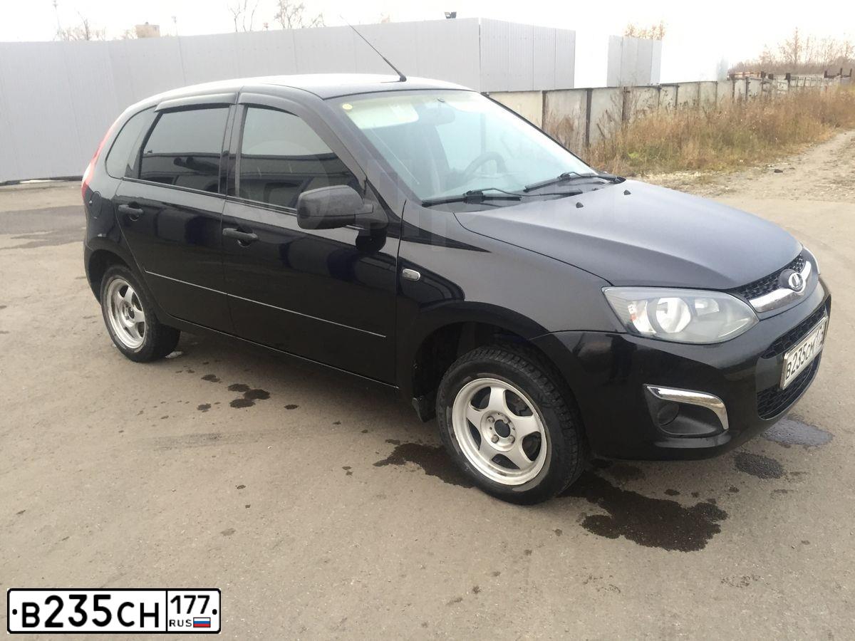 Фото автомобиля NISSAN NOTE, 2007 — госномер Х014АВ250. Цвет: КРАСНО-КОРИЧНЕВЫЙ