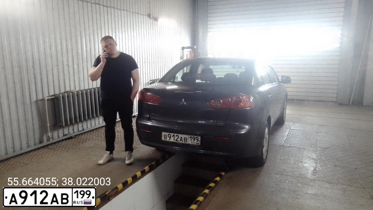 Фото автомобиля MITSUBISHI LANCER, 2007 — госномер В981РА790. Цвет: СЕРЫЙ