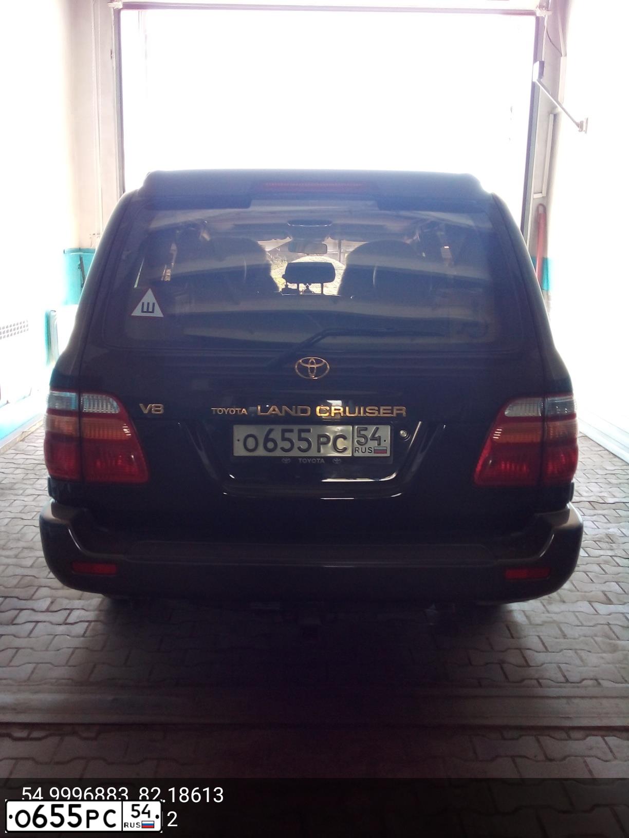 Фото автомобиля TOYOTA LANDCRUISER, 1999 — госномер О655РС54. Цвет: ЧЕРНЫЙ