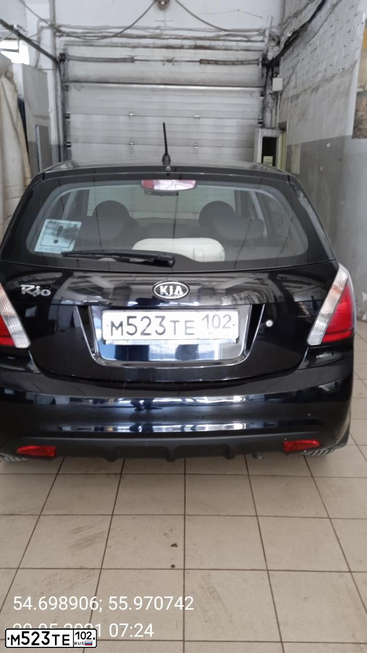 Фото автомобиля KIA RIO, 2010 — госномер М523ТЕ102. Цвет: ЧЕРНЫЙ