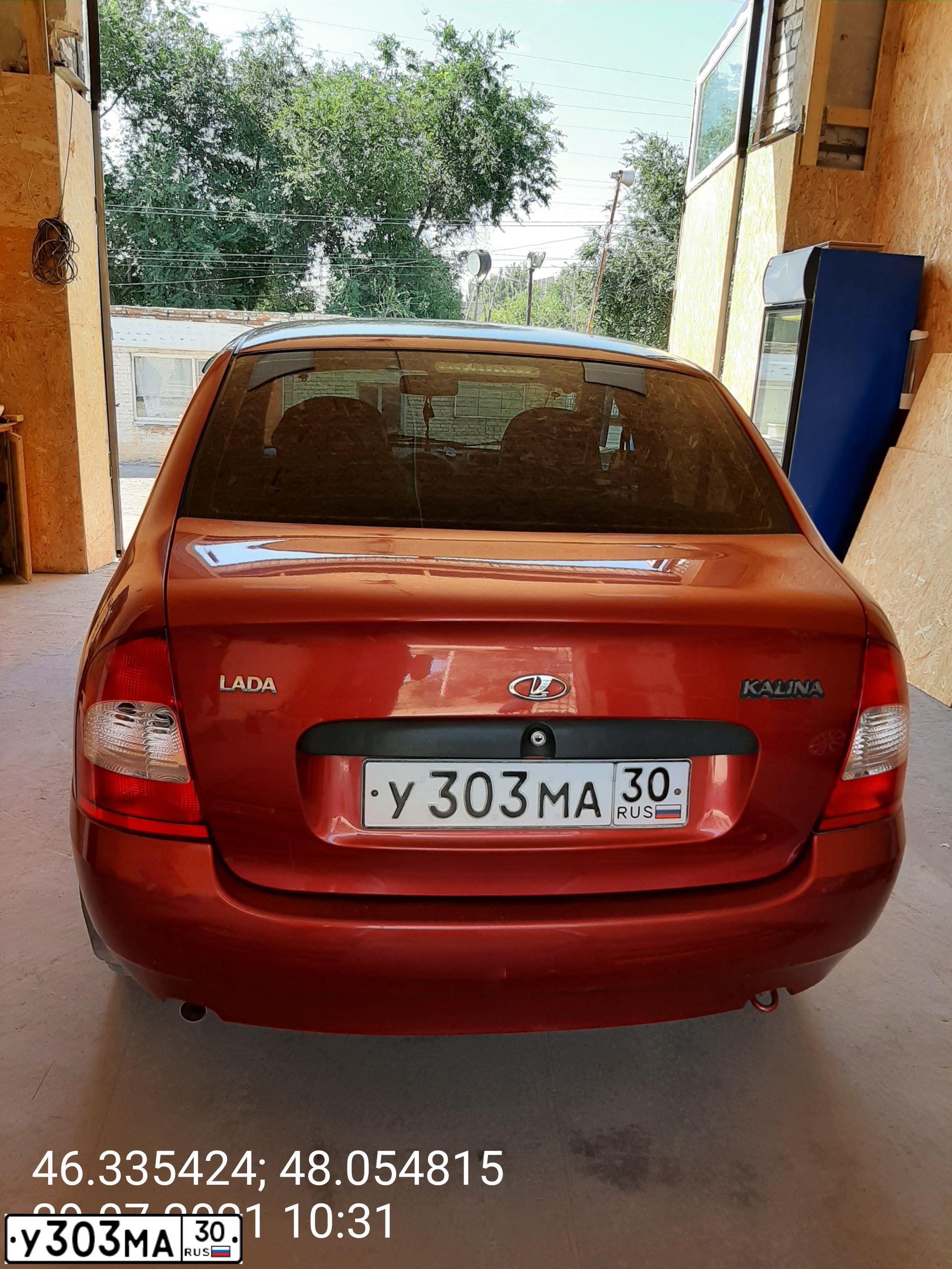 Фото автомобиля LADA 1118 KALINA, 2005 — госномер У303МА30. Цвет: СЕРЕБРИСТО-КРАСНЫЙ