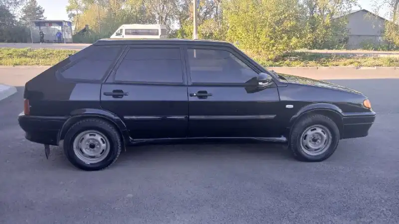 Фото автомобиля LADA 2114 SAMARA, 2012 — госномер М228КК774. Цвет: СИНЕ-ЧЕРНЫЙ
