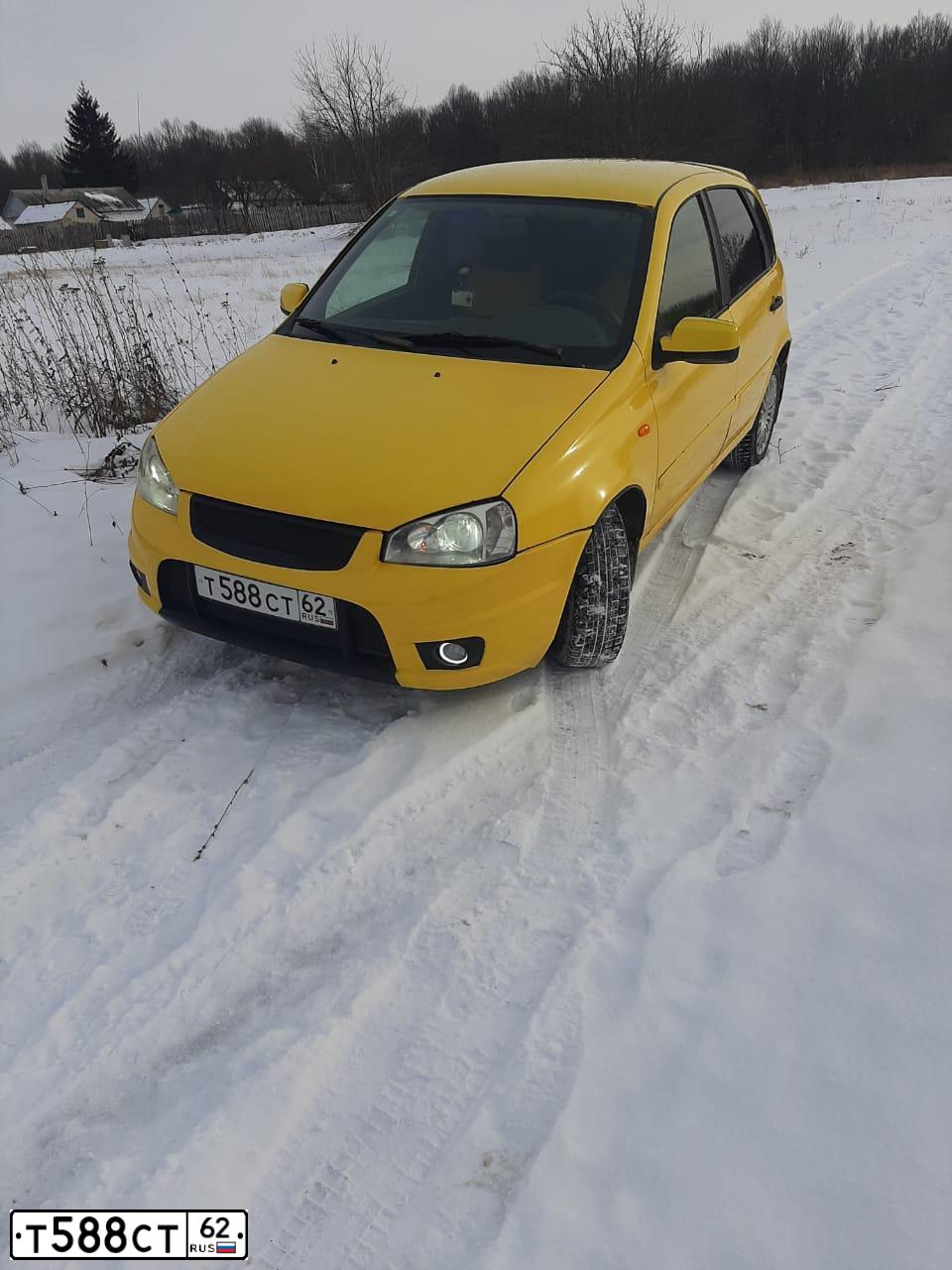 Фото автомобиля LADA KALINA, 2010 — госномер М733УМ124. Цвет: ЖЁЛТЫЙ