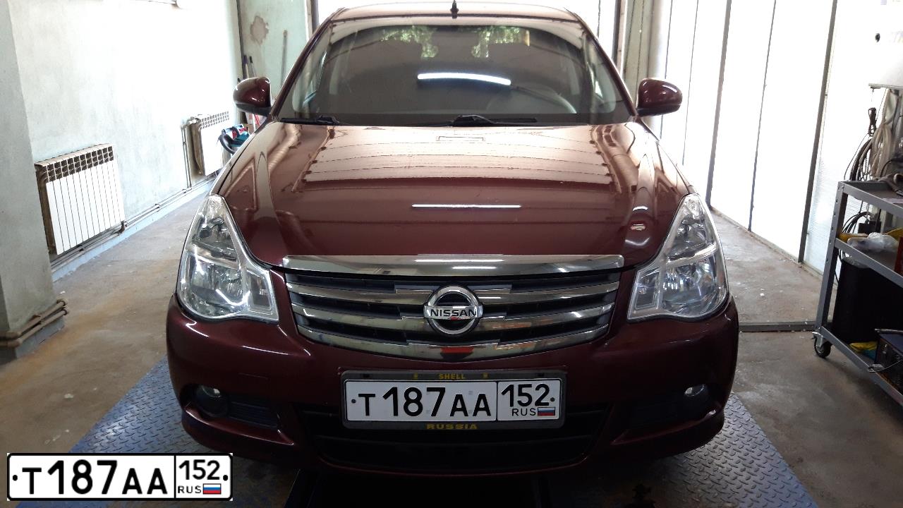 Фото автомобиля NISSAN ALMERA /AVTOVAZ/, 2014 — госномер Т187АА152. Цвет: Красный