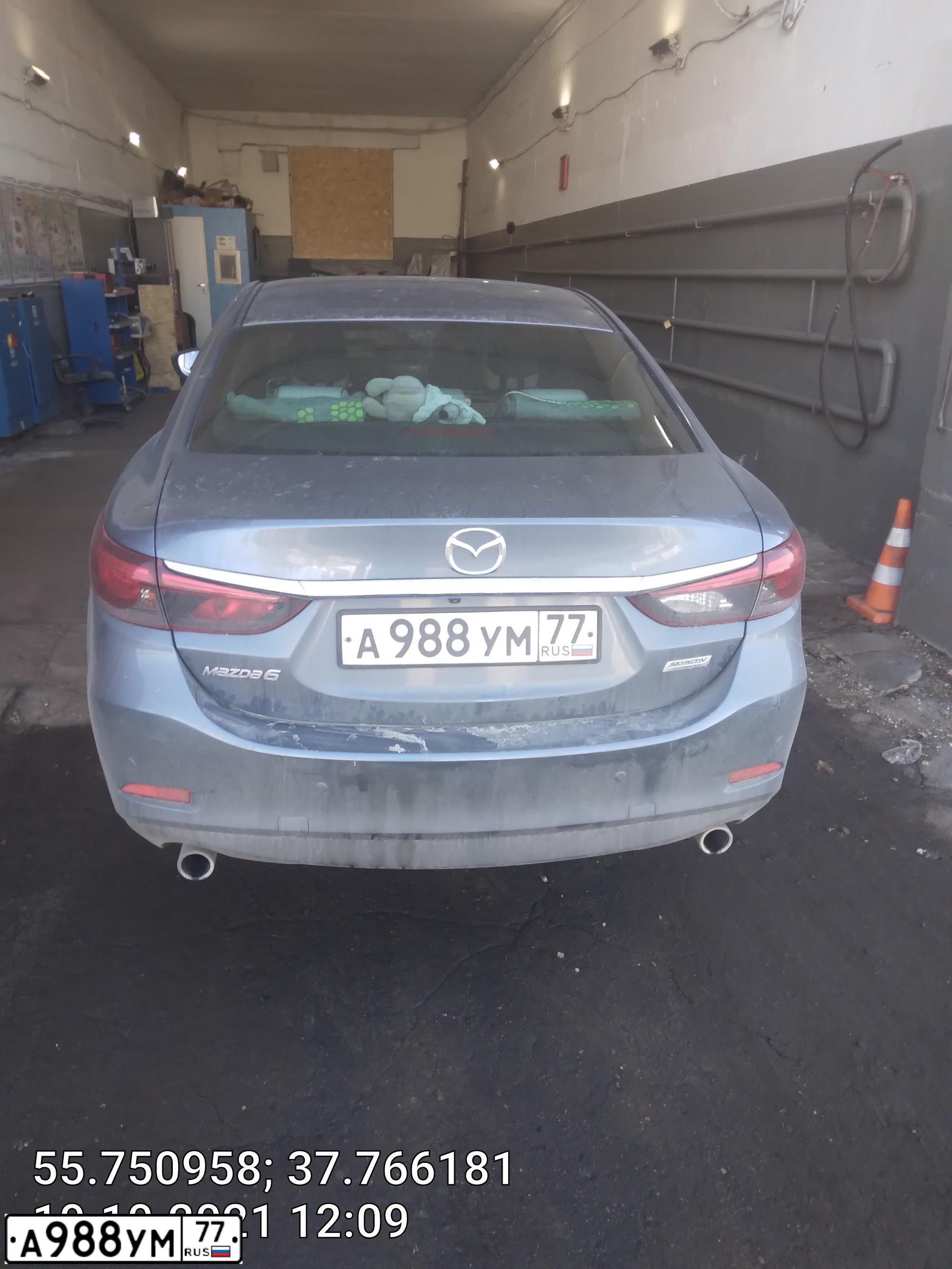 Фото автомобиля NISSAN TIIDA, 2012 — госномер Е110ТС799. Цвет: Красный