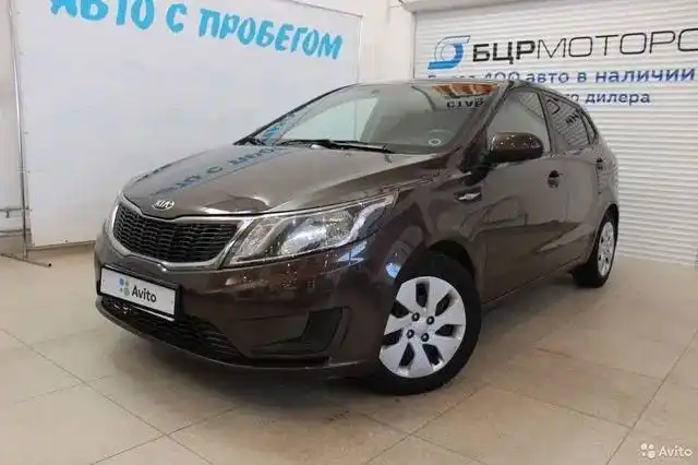 Фото автомобиля KIA RIO, 2015 — госномер Н966ТК152. Цвет: КОРИЧНЕВЫЙ