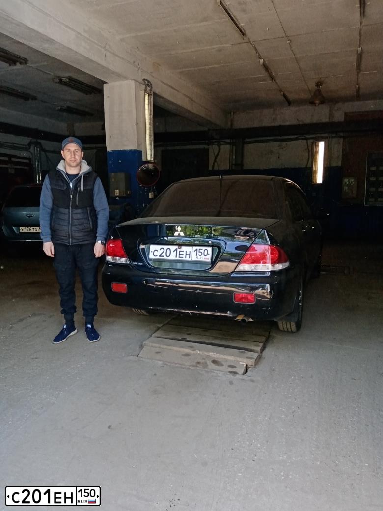 Фото автомобиля MITSUBISHI LANCER, 2006 — госномер М544УВ69. Цвет: ЧЕРНЫЙ