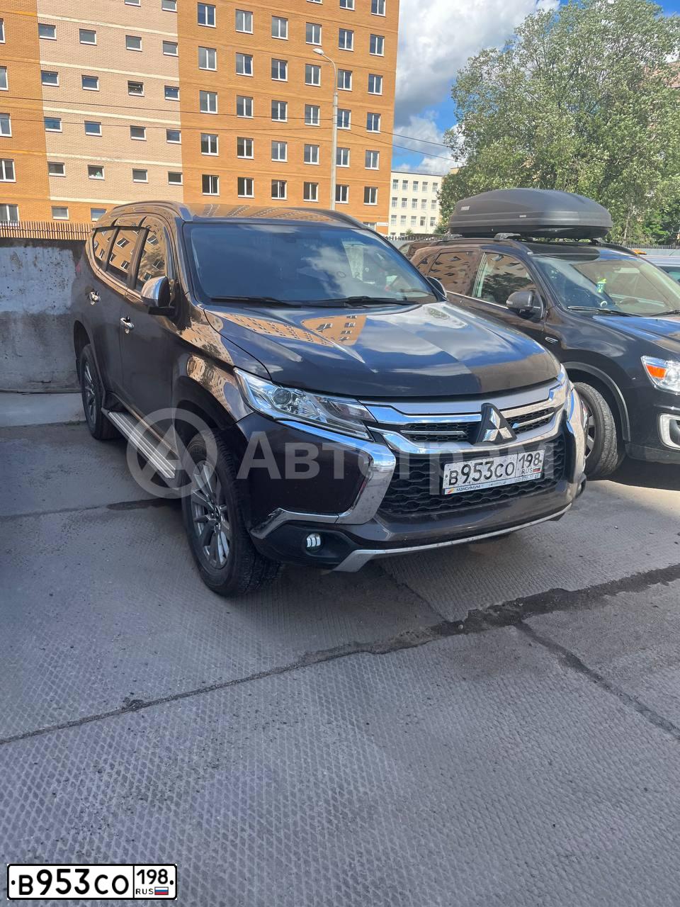 Фото автомобиля MITSUBISHI PAJERO SPORT, 2019 — госномер В953СО198. Цвет: Коричневый