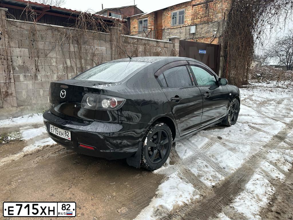 Фото автомобиля MAZDA 3, 2007 — госномер Е715ХН82. Цвет: ЧЕРНЫЙ