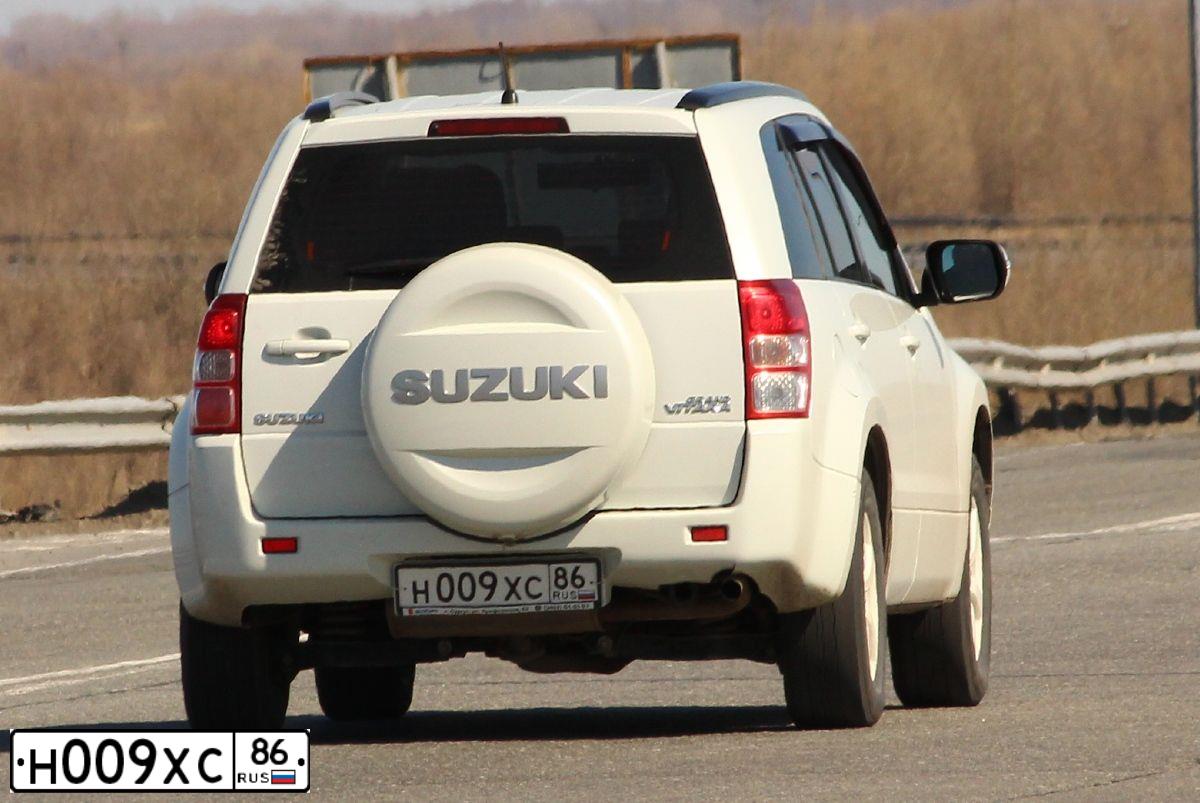 Фото автомобиля SUZUKI /GRAND/ VITARA, 2011 — госномер Н009ХС86. Цвет: Белый