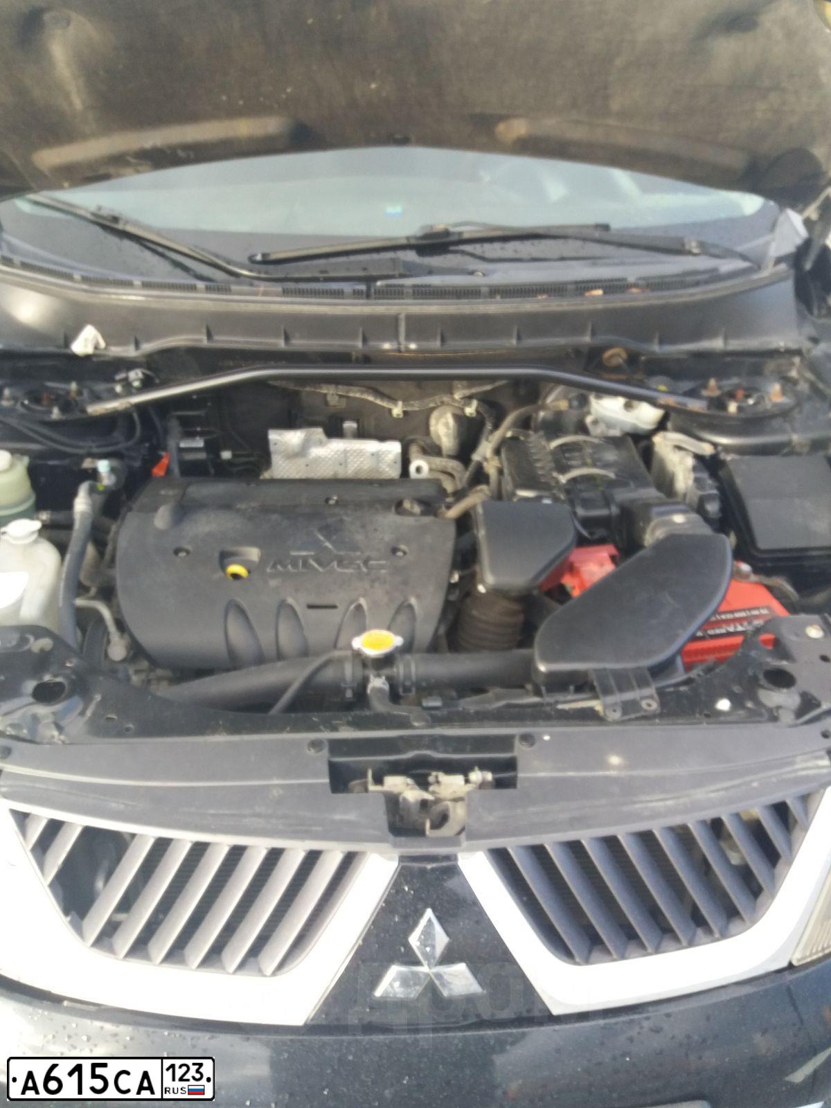 Фото автомобиля MITSUBISHI OUTLANDER, 2008 — госномер К001НС152. Цвет: ЧЕРНЫЙ