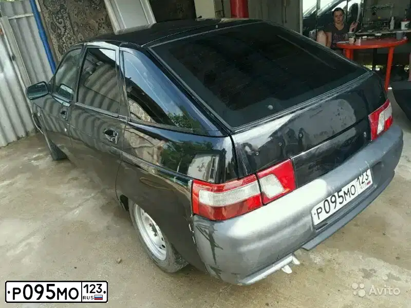 Фото автомобиля LADA 2112 LADA, 2008 — госномер Н009СС01. Цвет: Сине-Черный