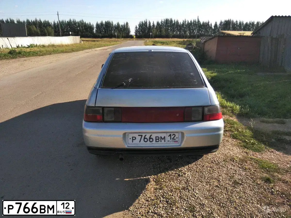 Фото автомобиля LADA 2112, 2002 — госномер Р766ВМ12. Цвет: СЕРЕБРИСТО-ГОЛУБОЙ