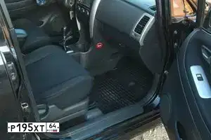 Фото автомобиля SUZUKI LIANA, 2005 — госномер Е392УН134. Цвет: ЧЕРНЫЙ
