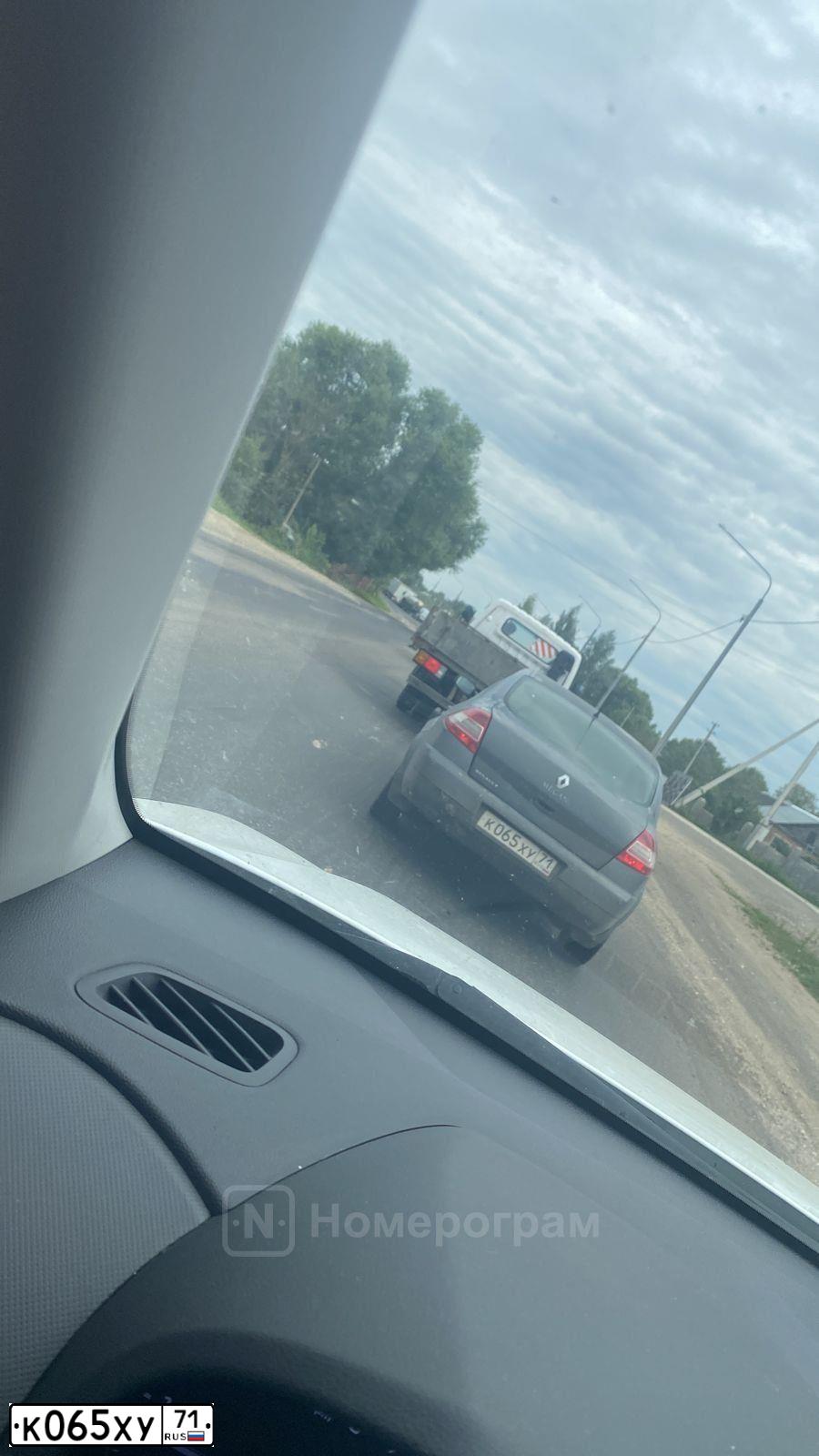 Фото автомобиля RENAULT MEGANE, 2007 — госномер К065ХУ71. Цвет: СЕРЫЙ