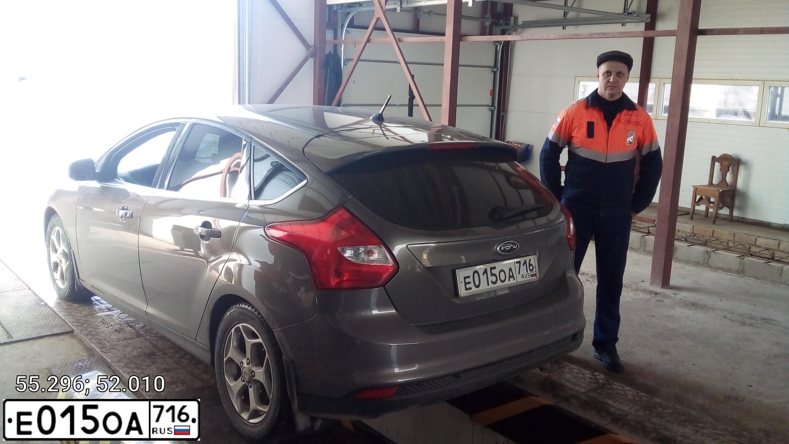 Фото автомобиля FORD FOCUS, 2011 — госномер Е015ОА716. Цвет: СЕРО-КОРИЧНЕВЫЙ